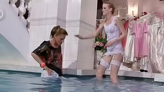 Two Bitches Having A Water Fight