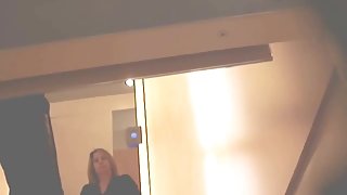 Fun with a naked girl in a shop changing room