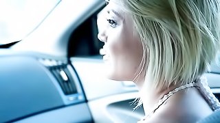 Young blonde babe makes out in a car with a sweet older lesbian mom