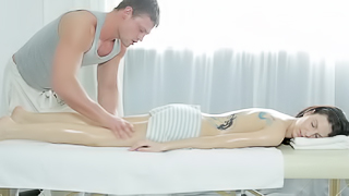 A tight body is getting taken care off on the massage table