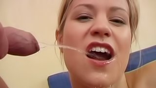 Mini-skirt clad blonde with perky tits enjoys being pissed on