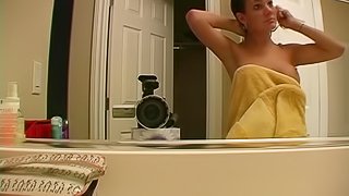 Naked skinny slut in homemade video with small tits getting her makeup on