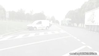 Curly busty MILF strokes and sucks a nice cock outdoors