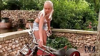 Blonde girl with little tits strips outdoors