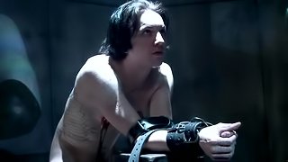 Bitch in a latex suit is going to torture and ride his dick