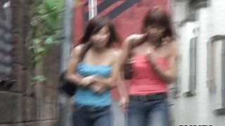 Boob sharking of two cute Japanese chicks on the street