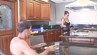 A Horny Housewife Fucks Her Man in the Kitchen