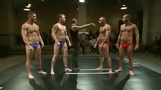 Two Teams Of Wrestlers Get Horny During A Match. It's A Fuck Battle!
