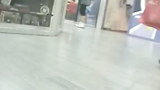 Candid street upskirt video with hot babe in short skirt