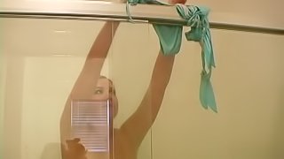 Amateur Blonde Masturbates Shaved Pussy In The Shower
