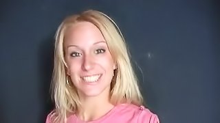 Blonde with Shaved Pussy Gets Big Black Cock in a Gloryhole