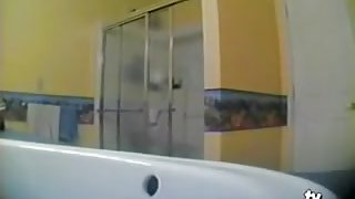 Voyeur clip shows a immature in bathroom