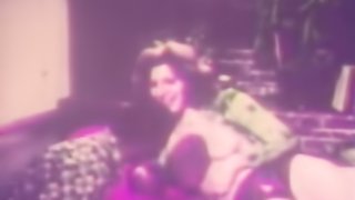 Elegant brunette in green patterned shirt enjoys a hard cock all for herself in a vintage setting
