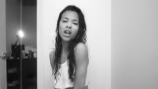 Pretty ebony teen dances seductively in front of the webcam