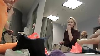 Girl in changing room spied naked in front of the mirror