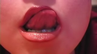 Babe with hot lips AnnaBelle Lee puts a lipstick on