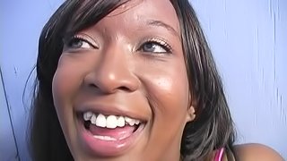 Long haired ebony in panties enjoys facial cumshot in interracial gloryhole scene