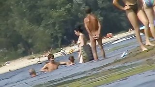 Hot mature women filmed by a voyeur on the nudist beach
