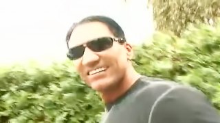 Her sexy ebony lips surround his white cock