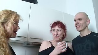 Mature redhead and a mature blonde get fucked deep