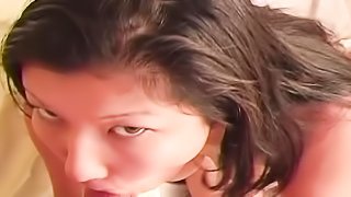 Big Asian titties get bounced around as chubby whore sucks dick for cum