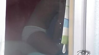 Window sex video with an asian slut who masturbates at home
