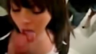 Hot brunette girl licking and sucking her boyfriend's  cock