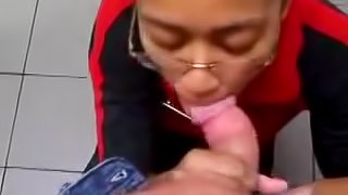 Ebony hussy wearing glasses sucks a weiner in homemade POV