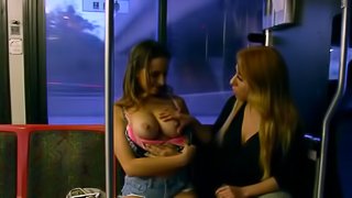 Two dirty-minded sluts have lesbian sex in public bus
