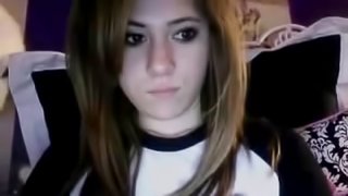 Horny teen shows her  jugs for the camera and pleasures her pussy